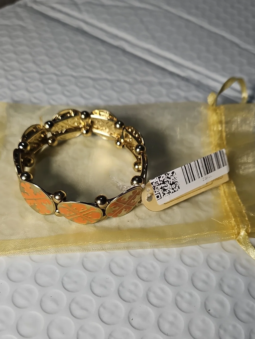 Tory Burch Gold-Tone Bracelet with Coral Orange Enamel Clover Motifs